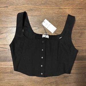 Cropped vest with snap buttons and smocked back